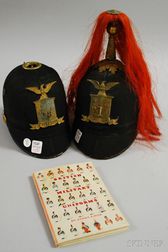 Two 19th Century New York State National Guard Helmets and a British Uniforms Book. 